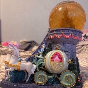 Enchanted Cinderella Carriage Snow Globe with Pink and Gold Accents